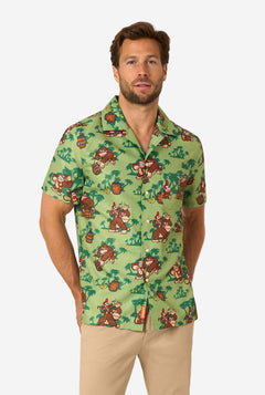 Man wearing a green Hawaiian shirt with Donkey Kong character print on a white background