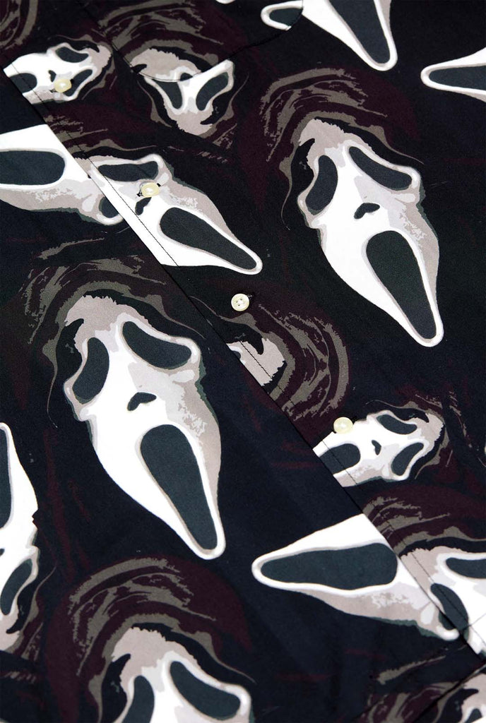 Man wearing black hawaiian shirt with GhostFace print