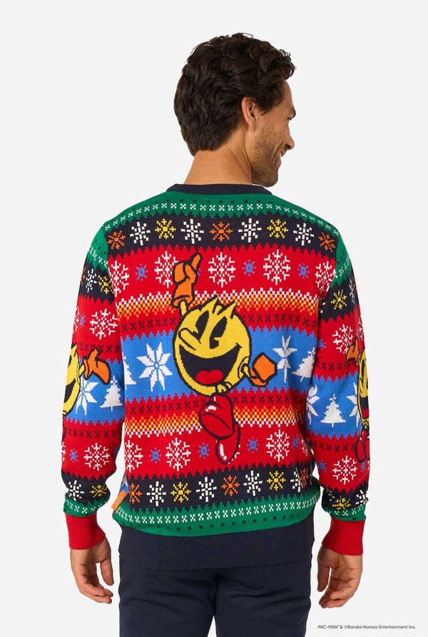 Back view of the knitted Christmas sweater showing Pac-Man and festive snowflake designs across the back.