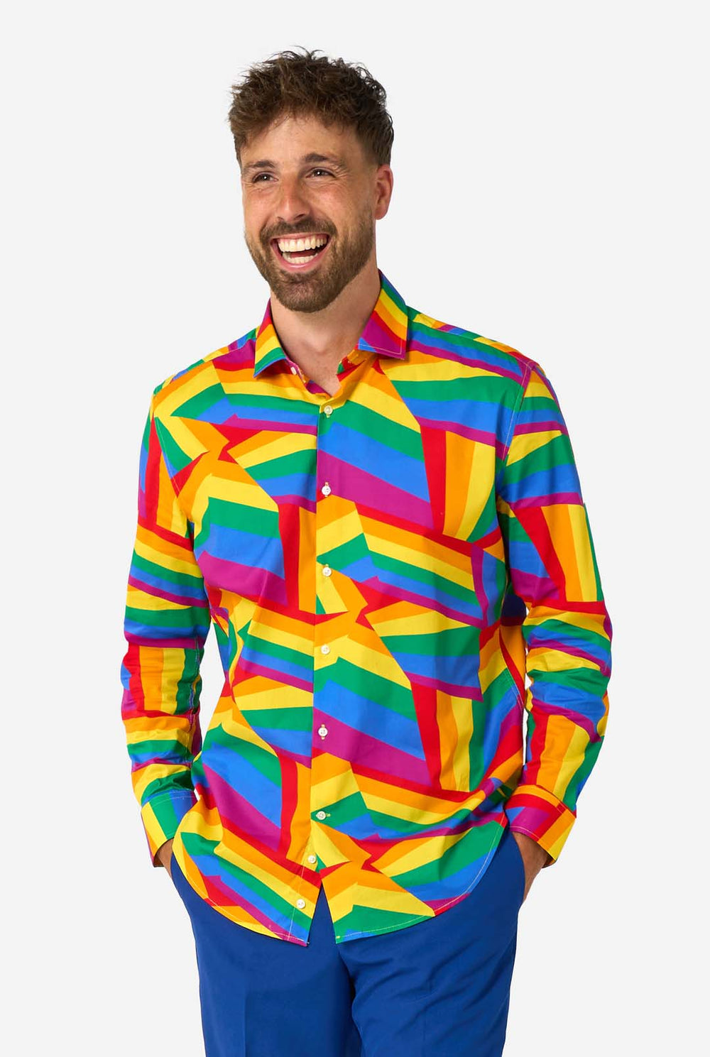 Man wearing a Rainbow colored geometric-patterned shirt on a white background