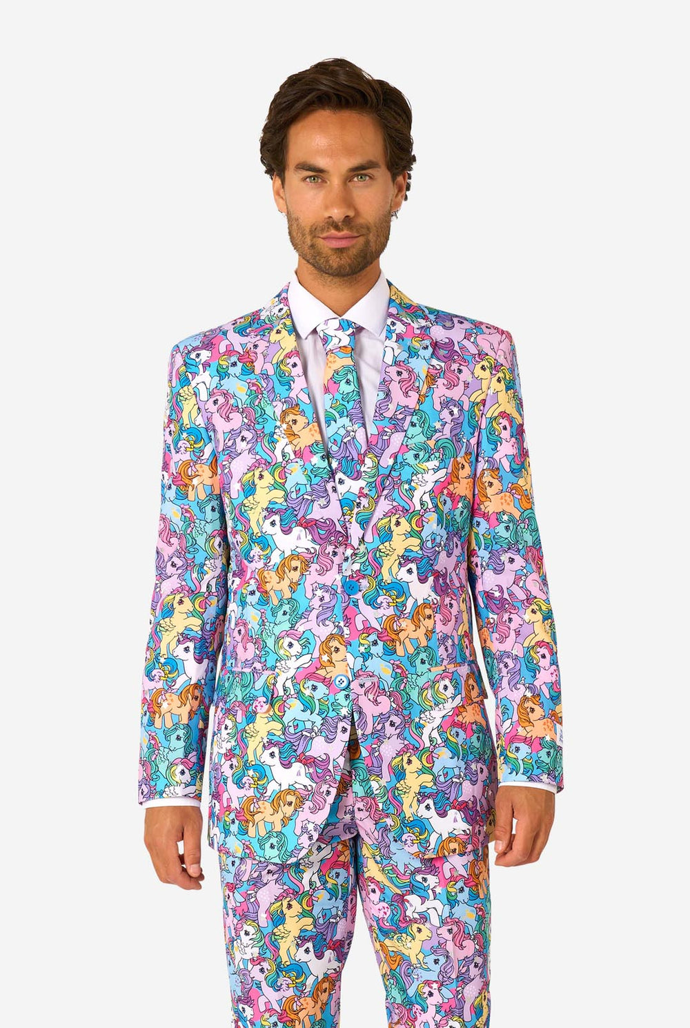 Man wearing a colorful My Little Pony suit with My Little Pony character pattern on a light background.