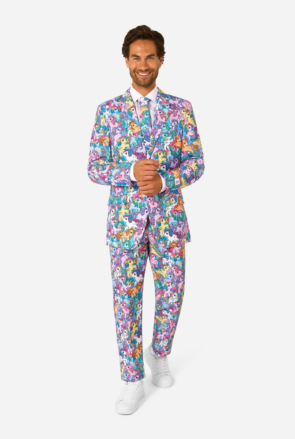 Man wearing a colorful My Little Pony suit with My Little Pony character pattern on a light background.
