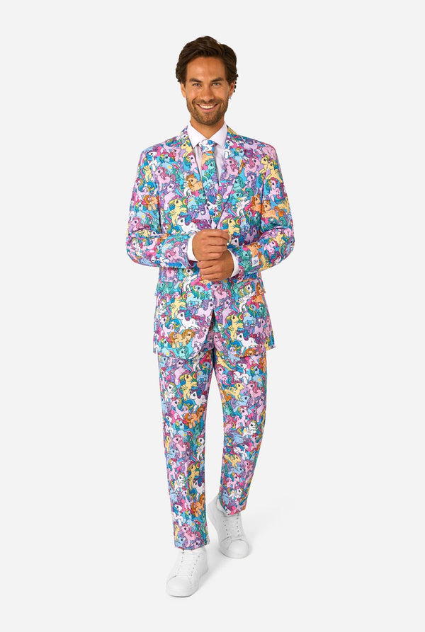 Man wearing a colorful My Little Pony suit with My Little Pony character pattern on a light background. Full body image.