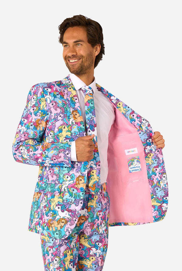 Man wearing a colorful My Little Pony suit with My Little Pony character pattern on a light background. Showing inside of jacket.
