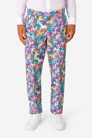 Man wearing a colorful My Little Pony suit with My Little Pony character pattern on a light background. Pants view.