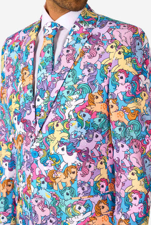 Man wearing a colorful My Little Pony suit with My Little Pony character pattern on a light background. Chest close up.