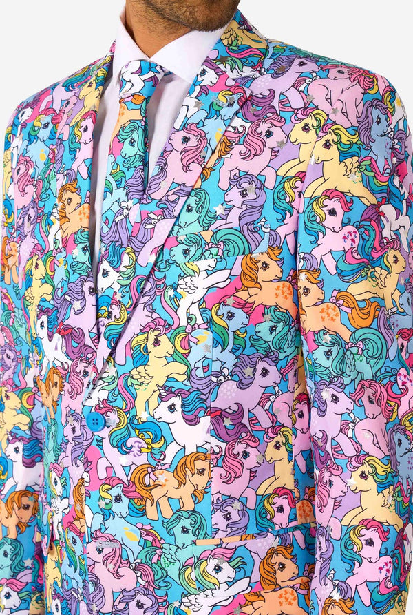 Man wearing a colorful My Little Pony suit with My Little Pony character pattern on a light background. Chest close up.