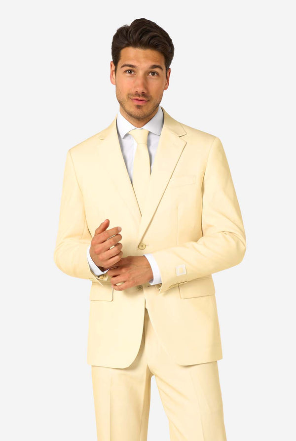 Elegant men's suit in a soft pastel yellow shade, perfect for weddings, summer events, and formal occasions. This stylish tailored suit features a slim fit design, notch lapels, and a matching tie for a sophisticated look. Ideal for modern gentlemen looking to make a statement with a light-colored pastel suit.