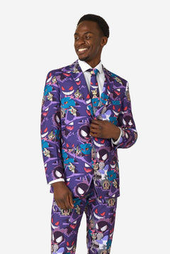 Man wearing a colorful suit with a pattern of Pokemon ghost characters on a white background