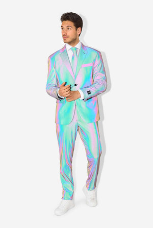 A man wearing a reflective suit, with a reflective tie and a white shirt on a white background. Photo taking with flash on.