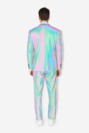 A man wearing a reflective suit, with a reflective tie and a white shirt on a white background. Photo taking with flash on, view from the back.