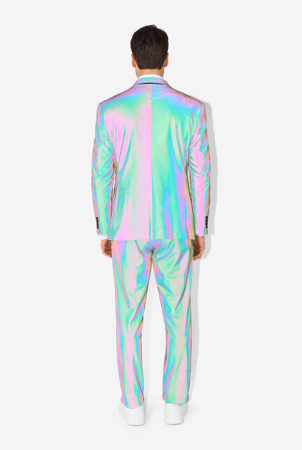 A man wearing a reflective suit, with a reflective tie and a white shirt on a white background. Photo taking with flash on, view from the back.