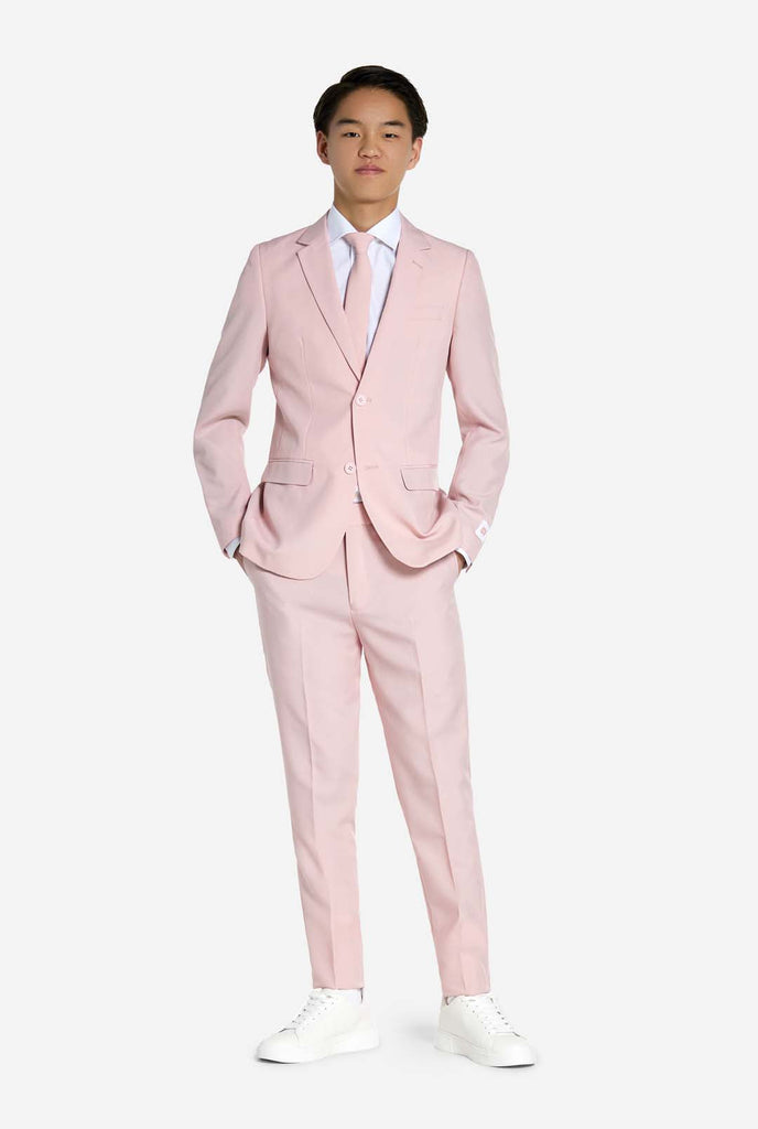 Teen wearing soft pink teen boys suit.