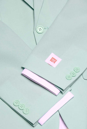 Teen wearing mint green teen boys suit, close up