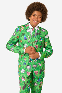A teen boy wearing a bright green Minecraft suit with iconic characters, including Creepers and Steve 