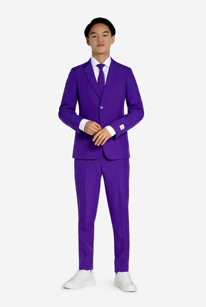 Teen wearing purple teen boys suit.