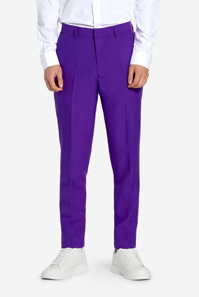 Teen wearing purple teen boys suit, pants view
