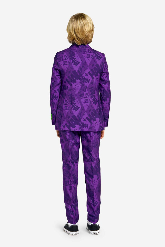 Teen wearing purple teen boys suit with a The Joker theme and green buttons. Showing the back side of the suit.