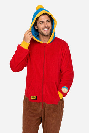 Male model wearing a red and brown South Park Cartman adult onesie with blue and yellow hood.