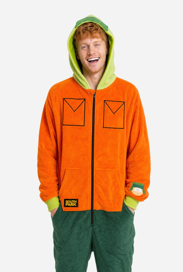 Male model wearing an orange and green South Park Kyle adult onesie with character sleeve patch.