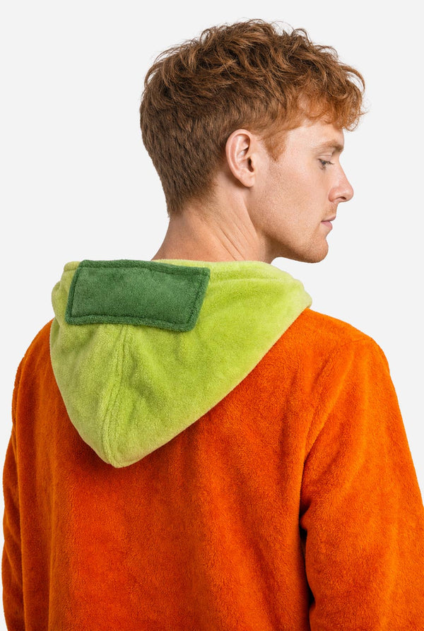 Close-up back view of the Kyle onesie showing the light green hood and darker green detail.