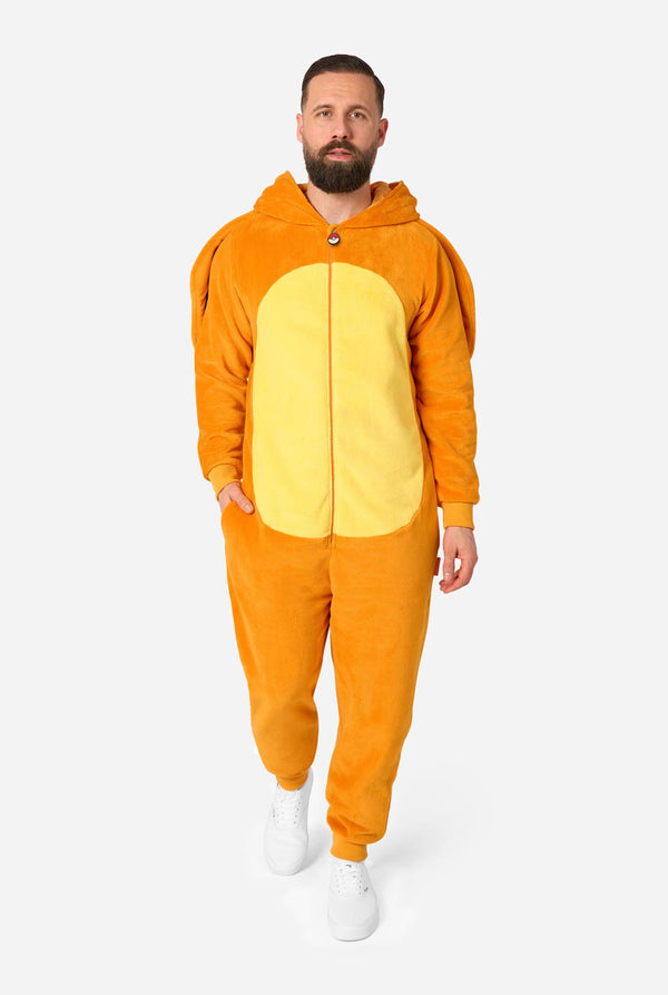 A man wearing a plush animal onesie in orange and yellow, standing against a light gray studio background.