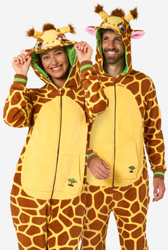 Two people wearing giraffe-themed onesies on a white background