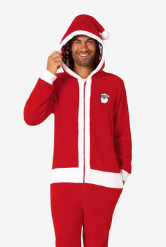 Man wearing a red onesie with a hood on a white background