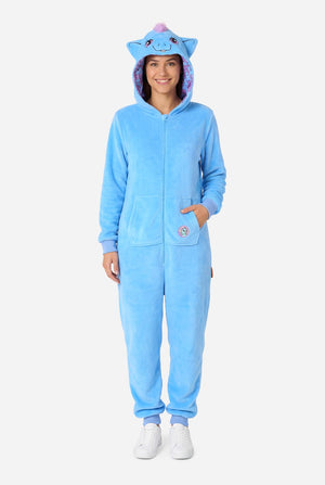Woman wearing a blue My Little Pony onesie with a hood on a light background. Full body image.