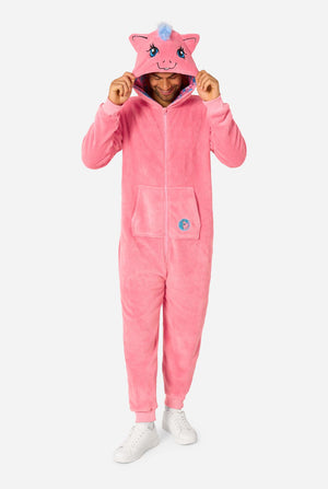 Man wearing a pink onesie with a My Little Pony design on a light background. Full body image.