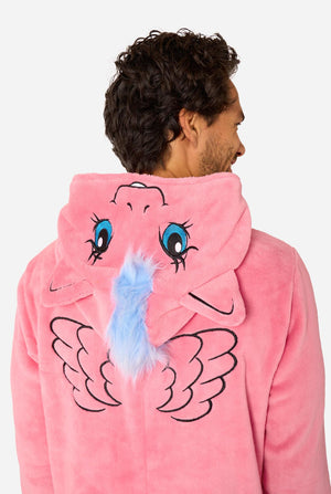 Man wearing a pink onesie with a My Little Pony design on a light background. View from the back, hood close up