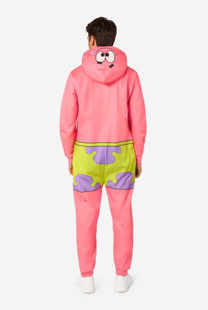 Front view of an adult wearing a pink Patrick Star onesie with a front zipper, green and purple shorts pattern, and hood down.