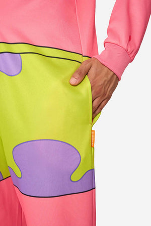 Back view of an adult wearing a pink Patrick Star onesie with a hood showing Patrick’s face and green shorts design on the lower half.