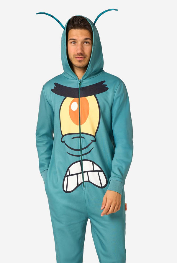 Person wearing a teal onesie with a hood featuring Plankton’s face from SpongeBob, including a large yellow and orange eye, black eyebrows, and two teal antennae.