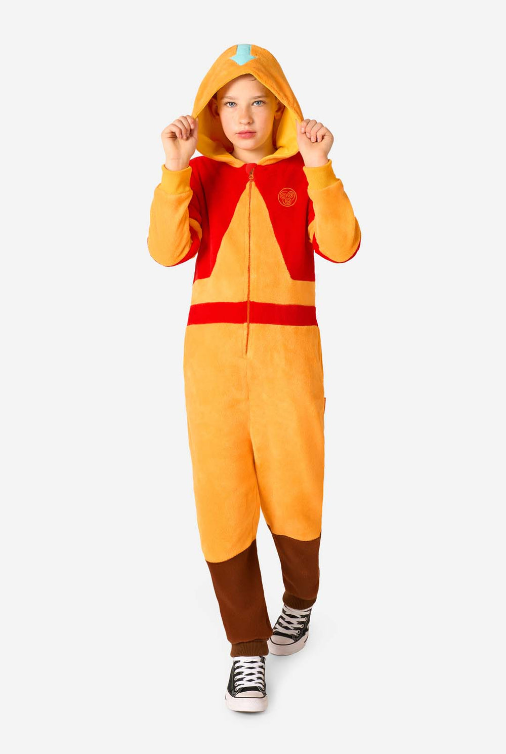 Child wearing a red and orange Aang onesie with a hood on a white background