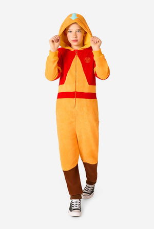 Person wearing a colorful Aang onesie with a hood on a white background