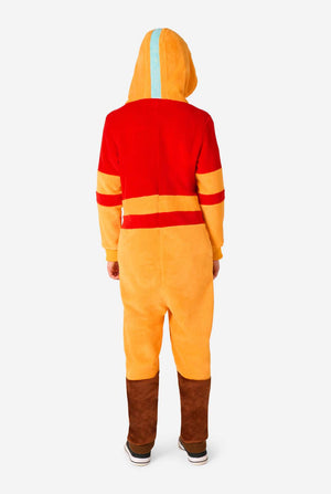 Person wearing a colorful Aang onesie with a hood on a white background