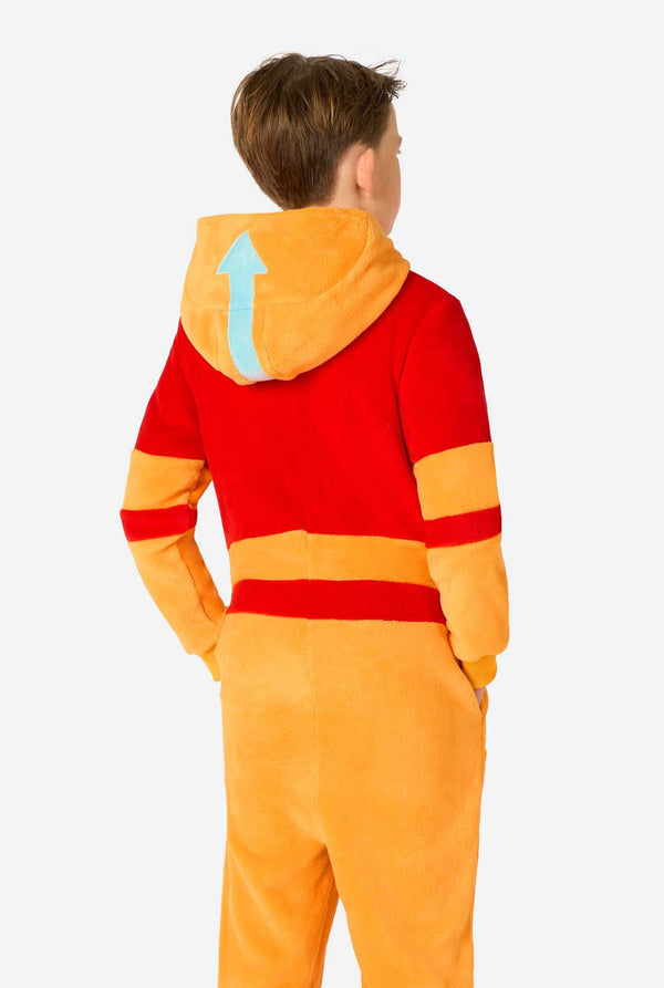 Child wearing a red and orange Aang onesie with a hood on a white background
