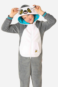 Child wearing a gray onesie with a lemur face design on a white background