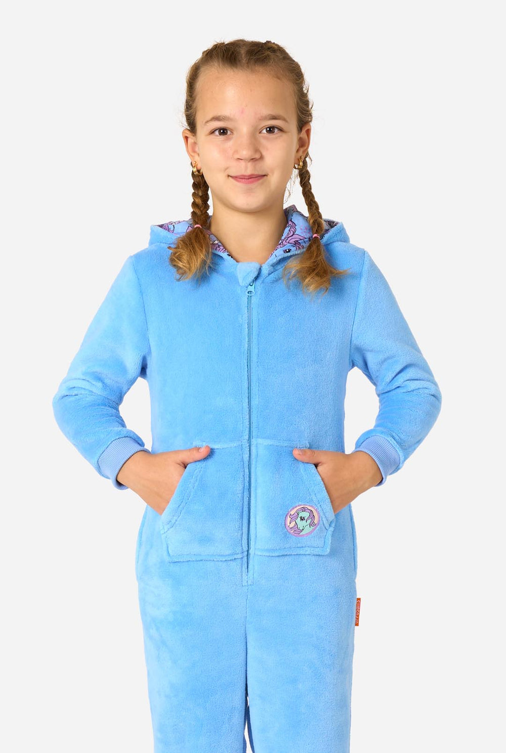 Child wearing a blue onesie resembling a My Little Pony on a light background.