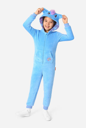 Child wearing a blue onesie resembling a My Little Pony on a light background. Full body image holding the ears.