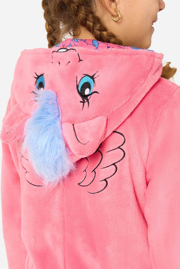 Child wearing a pink onesie resembling a My Little Pony on a light background. Close up from the back.
