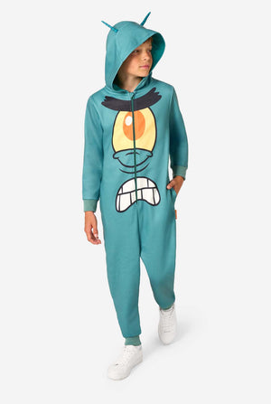 Full-body view of a child wearing a teal Plankton onesie with hood and antennae, hands in pockets, showing the large cartoon face printed on the front.