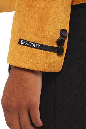Woman wearing golden velvet dinner jacket blazer, sleeve close up