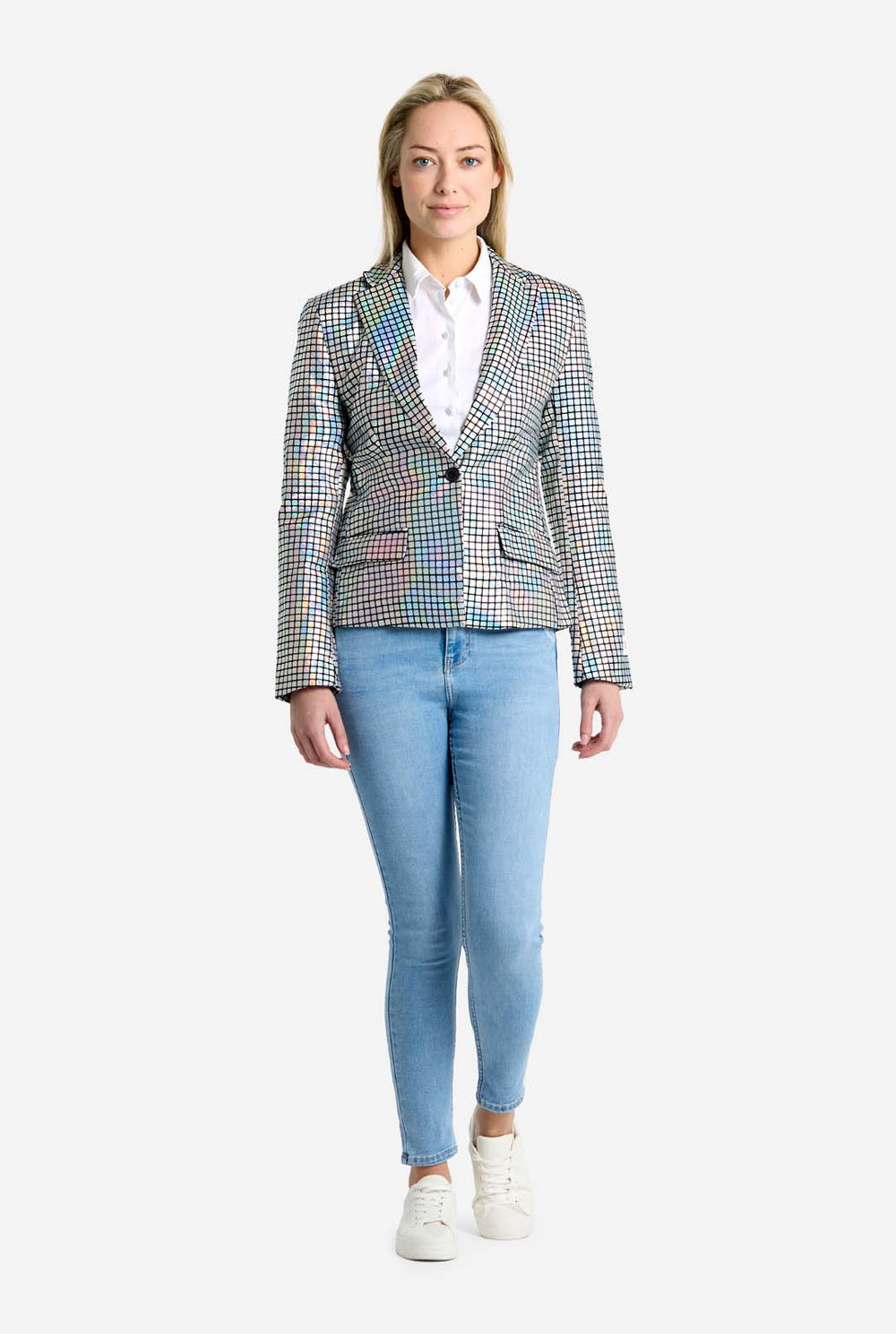 Woman wearing a checkered discoball like blazer over a white shirt with a plain background