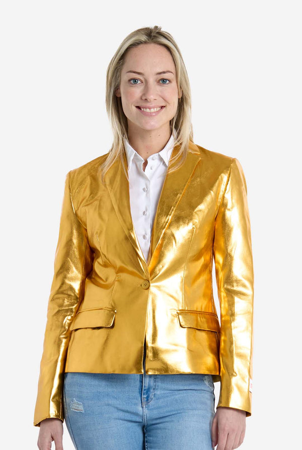 Woman wearing a shiny gold jacket on a white background