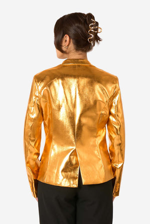 Person wearing a gold metallic jacket on a white background, view from the back.