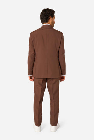 Back view of a man wearing a brown suit jacket and matching trousers.