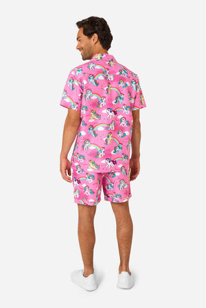 Man wearing pink summer set with My Little Pony and rainbow pattern on a light background.View from the back.