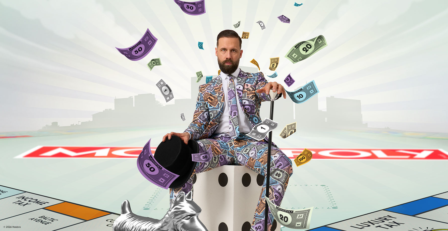 Man in a Monopoly money suit sitting on a large dice with money and Monopoly pieces floating around, on a Monopoly board.